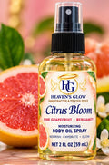 Heaven's Glow Citrus Bloom Moisturizing Body Oil Spray – 2 fl oz bottle shown in a styled product image